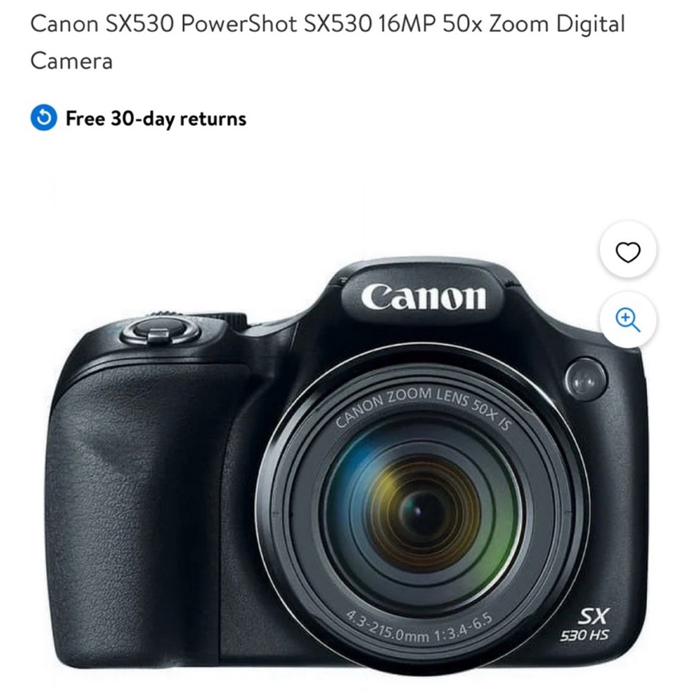 Canon Black Digital Camera with Large Zoom Lens and Textured Grip